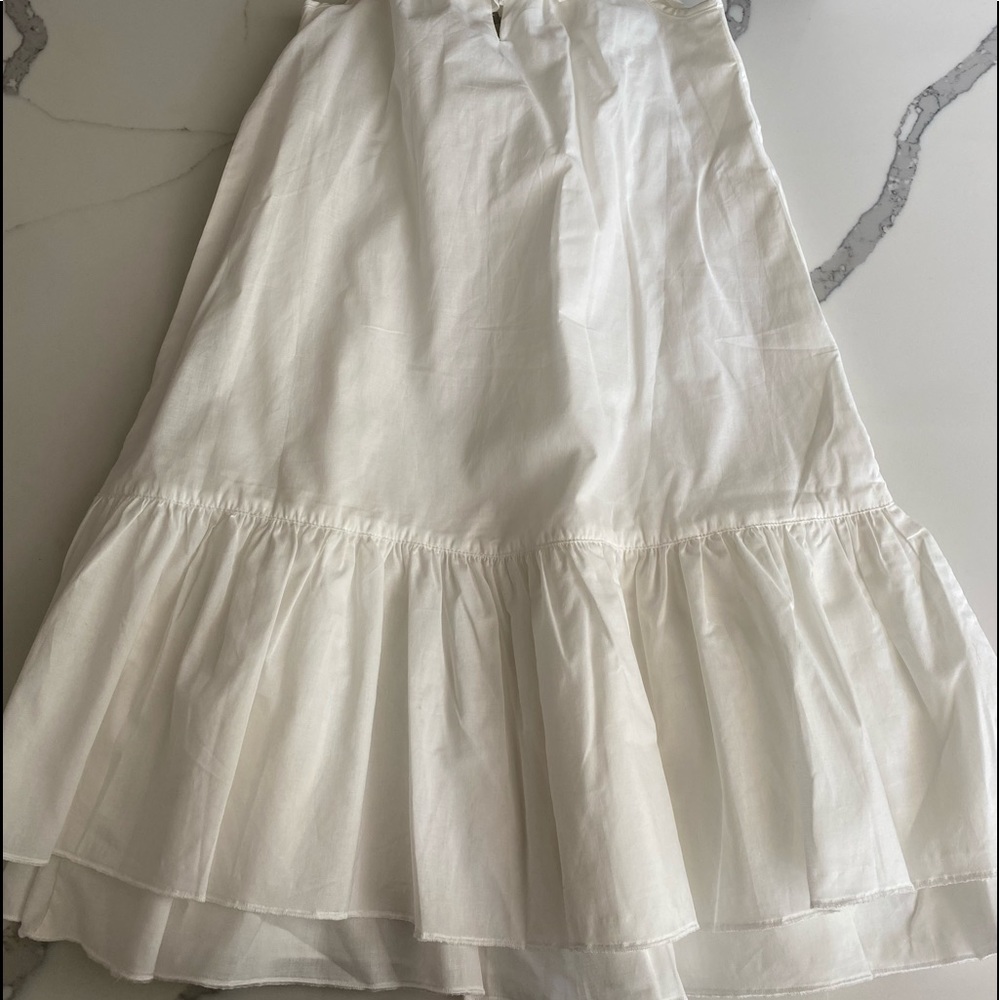 Cotton dress with neck ruffle/ brown button